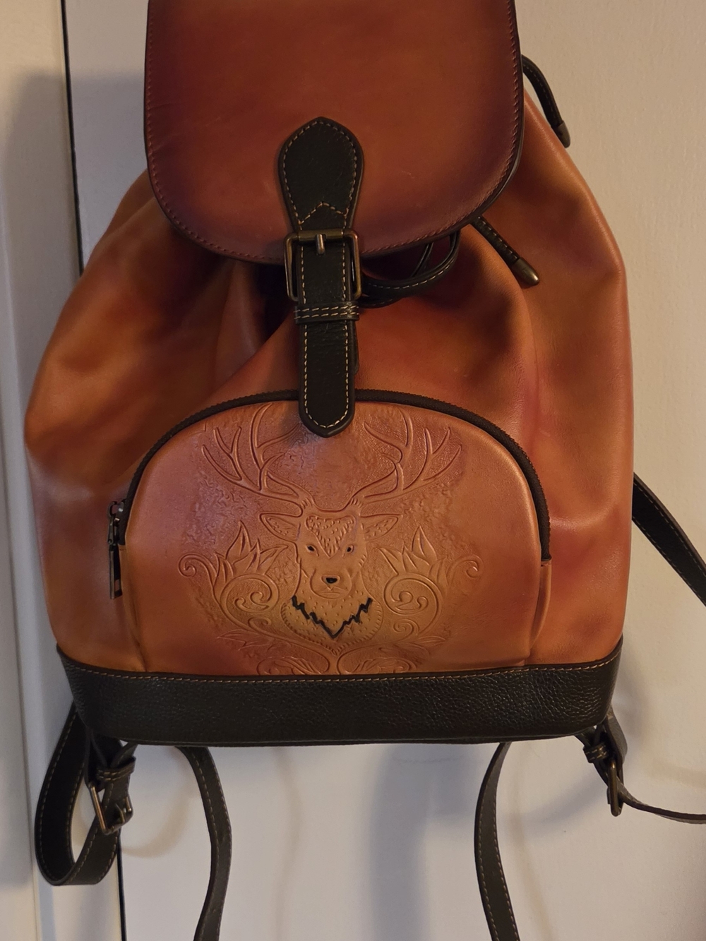 Tan Embossed Deer Motif Leather Backpack